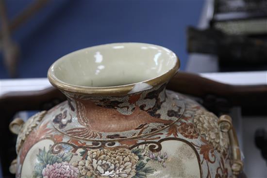 A large Japanese Satsuma pottery ovoid vase and stand, by Kinkozan, late 19th century, 58cm., damages